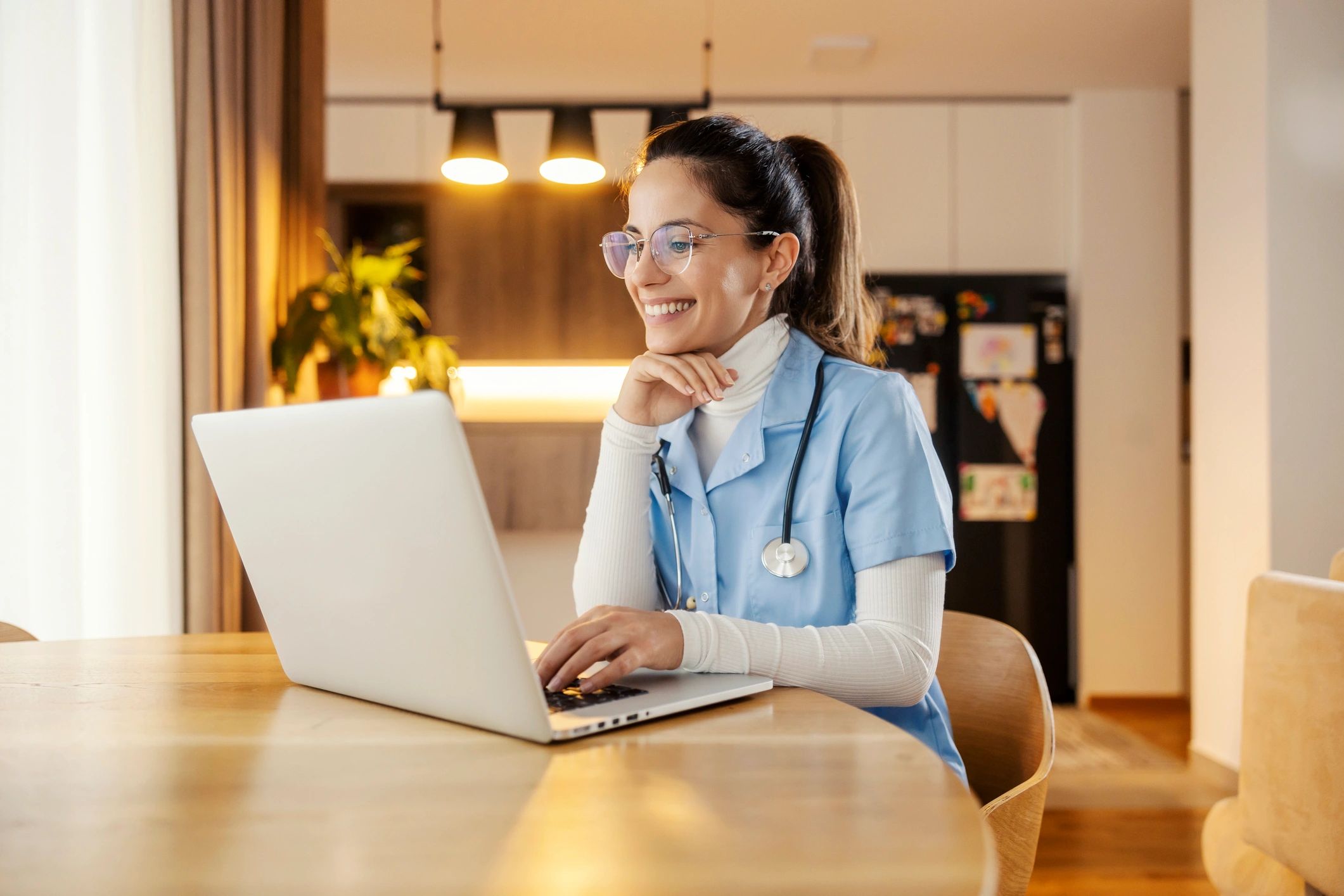 Doctor having an online consultation on a laptop